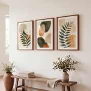 Abstract Wall Art Featuring Stylized Green Fern Leaves - Dark Brown Framed Poster with White Border - Artworksets
