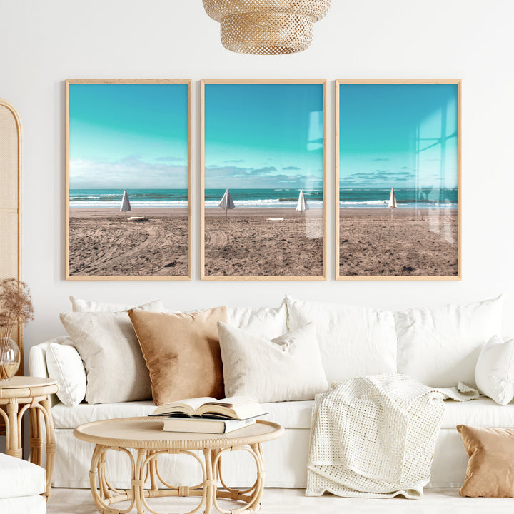 Closed Umbrellas beach pictures for wall beside Blue Surf - Natural Wood Framed Poster No Border - Artworksets