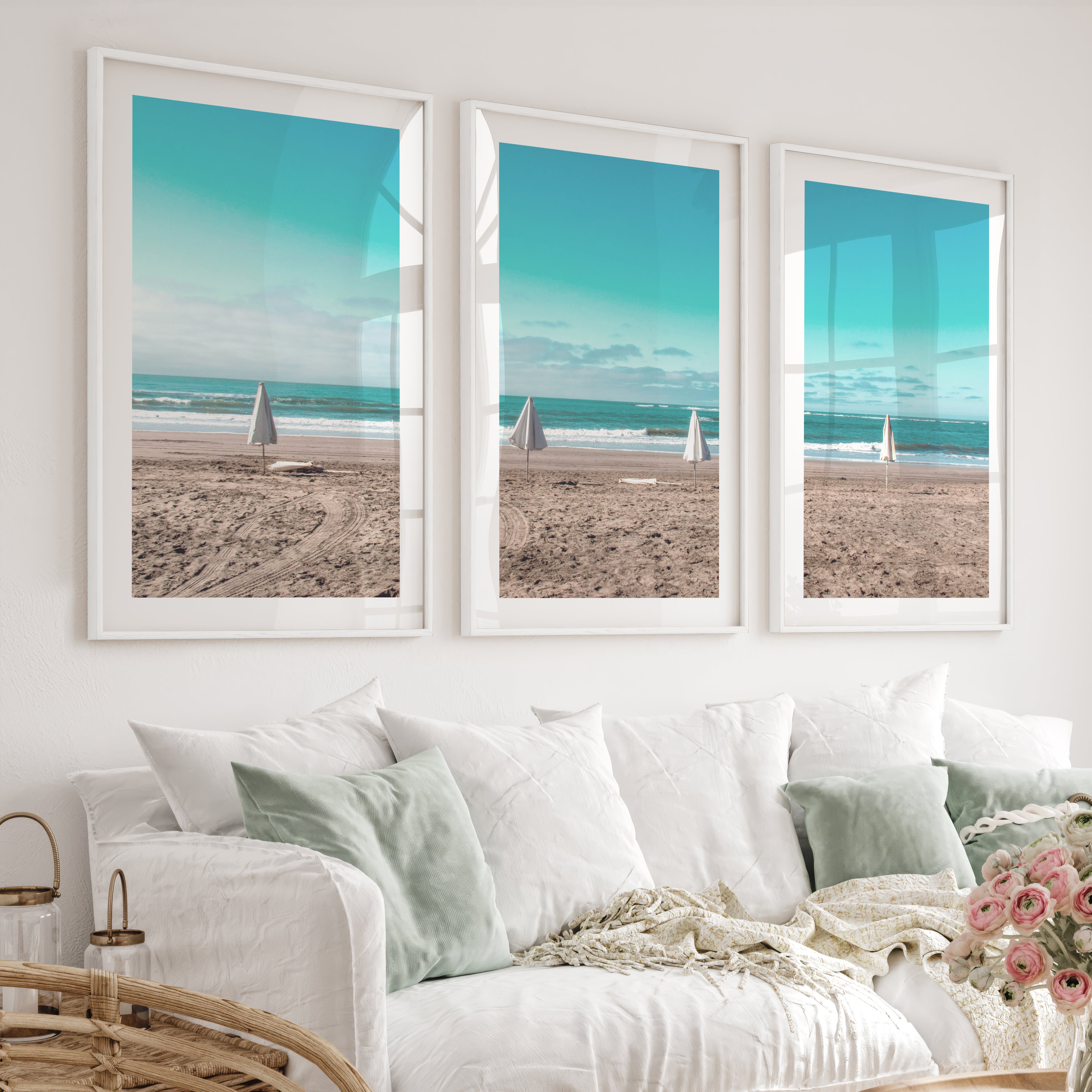 Closed Umbrellas beach pictures for wall beside Blue Surf - White Framed Poster with White Border - Artworksets