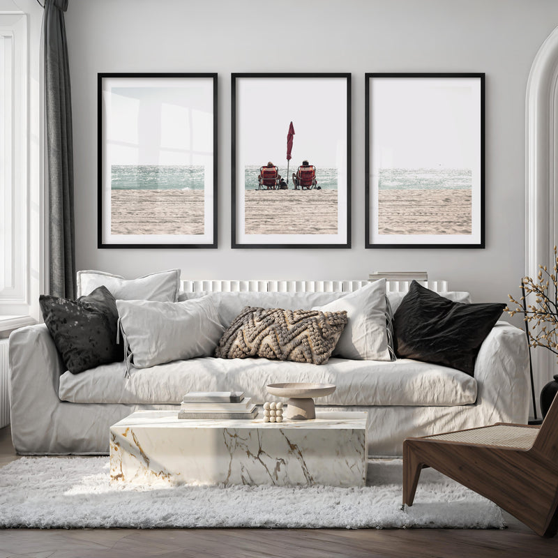 Red Chairs by the Ocean beach pictures to hang on wall - Black Framed Poster with White Border - Artworksets