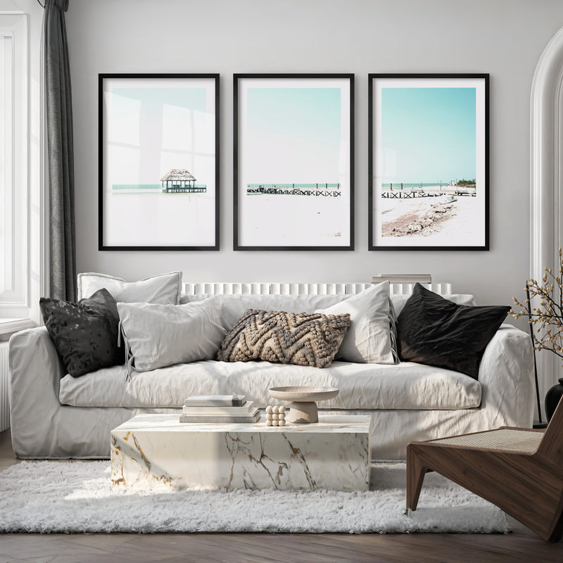 Beach wall art prints with a Quiet Pier Hut - Black Framed Poster with White Border - Artworksets
