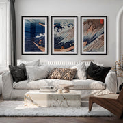 Japanese Wall Art Featuring Stylized Clouds on Deep Blue Triptych - Black Framed Poster with White Border - Artworksets