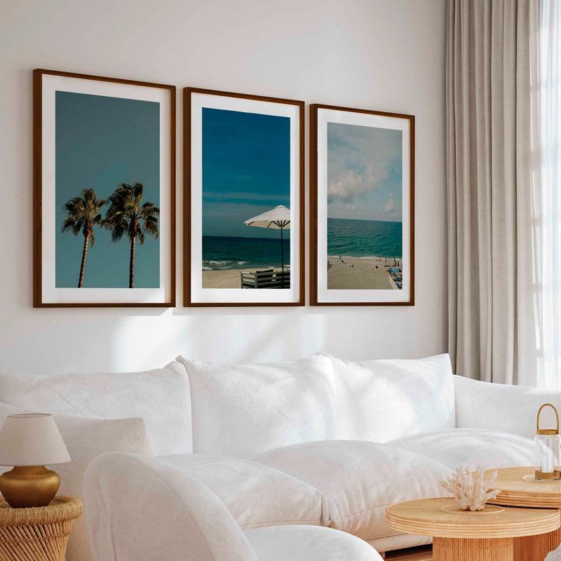 Multi Piece Wall Art – Beach Umbrella, Palms & Shoreline (Set of 3) - Dark Brown Framed Poster with White Border - Artworksets