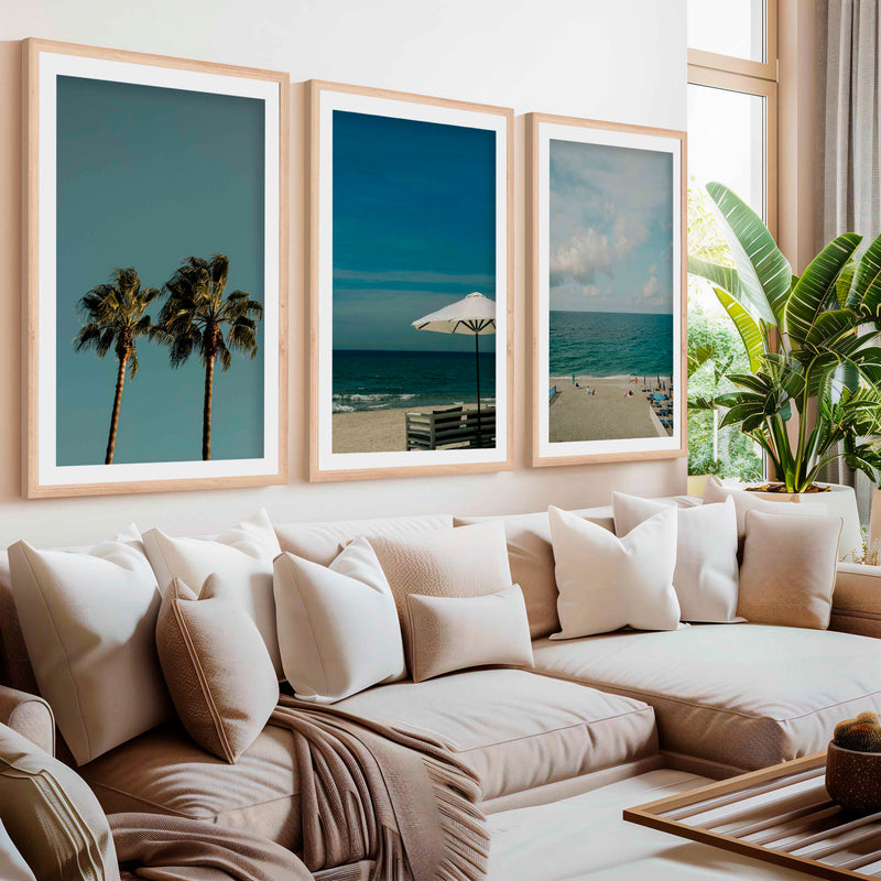 Multi Piece Wall Art – Beach Umbrella, Palms & Shoreline (Set of 3)- Natural Wood Framed Poster with White Border - Artworksets
