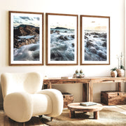 Rocky Shore ocean poster art at Sunset - Dark Brown Framed Poster with White Border - Artworksets