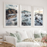 Rocky Shore ocean poster art at Sunset - White Framed Poster with White Border - Artworksets