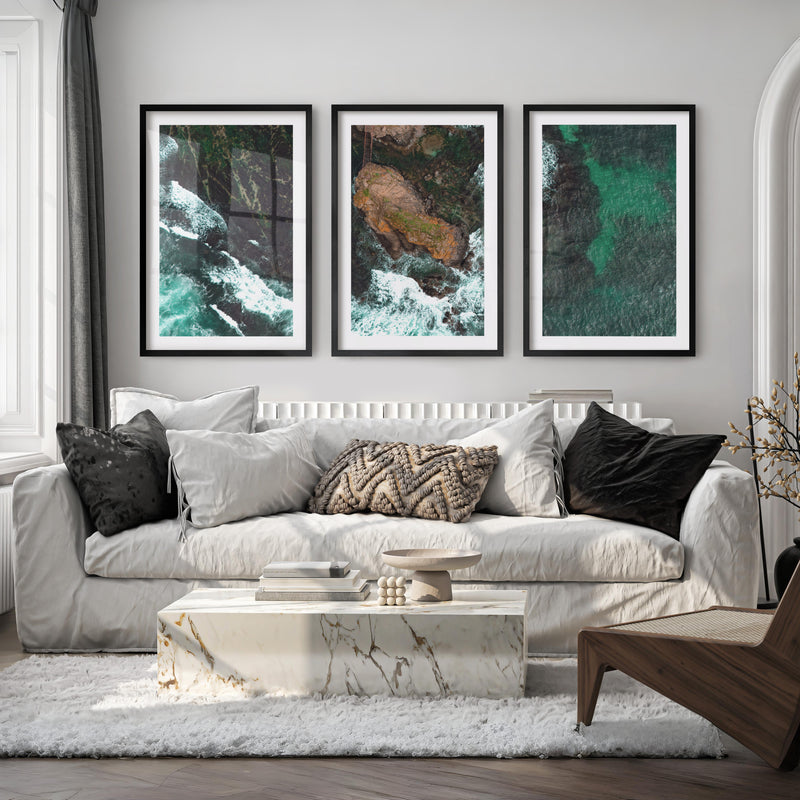 Aerial rocky cove ocean print with foaming surf - Black Framed Poster with White Border - Artworksets