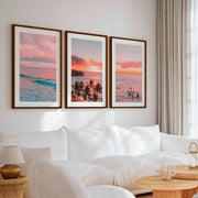 Pink Coastal Wall Art – Tropical Sunset Surf Set (3 Pieces) - Dark Brown Framed Poster with White Border - Artworksets