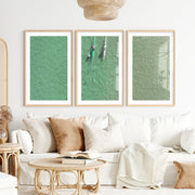 Aerial kayaks sea print over clear green water- Natural Wood Framed Poster with White Border - Artworksets