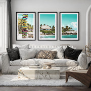 Colorful Signpost sea view wall art at Tropical Shore - Black Framed Poster with White Border - Artworksets