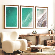 Turquoise Coast sea wall decor with Stone Shoreline - Dark Brown Framed Poster with White Border - Artworksets