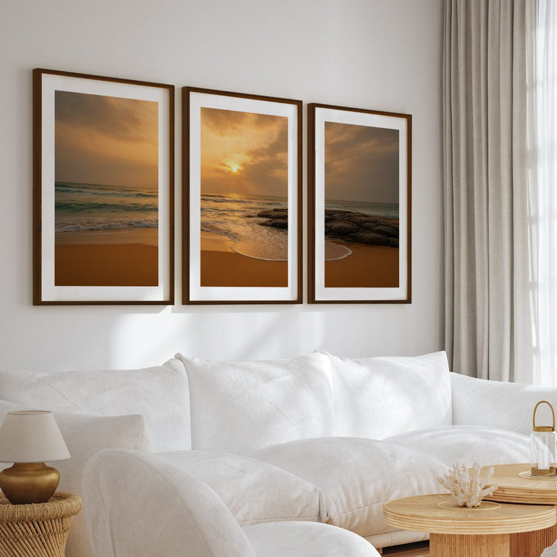 Seaside Sunset Triptych – Warm Coastal Wall Art in Golden Tones - Dark Brown Framed Poster with White Border - Artworksets