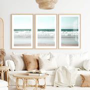 Foamy shoreline wave prints on a quiet beach- Natural Wood Framed Poster with White Border - Artworksets