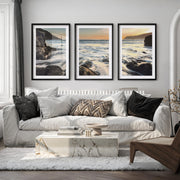 Sunset Cove wave wall art with Rocky Surf - Black Framed Poster with White Border - Artworksets