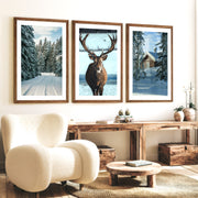 Winter Scene Wall Art – Snowy Forest, Deer & Cabin - Dark Brown Framed Poster with White Border - Artworksets