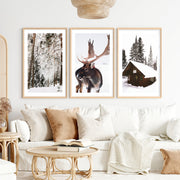 Winter Wall Art – Snowy Forest, Deer & Wooden Cabin- Natural Wood Framed Poster with White Border - Artworksets